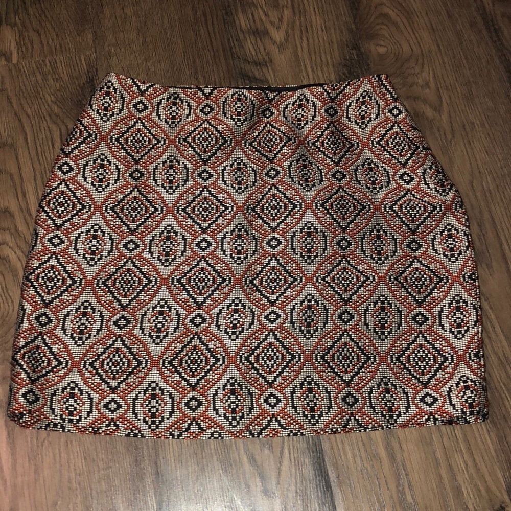 Tan, orange & black printed h&m skirt